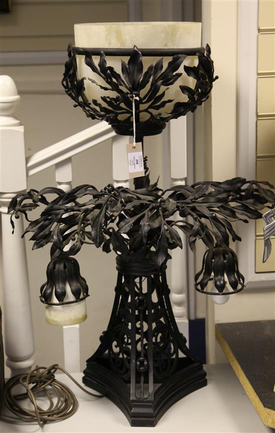 Early 20th century French black painted and wrought iron table lamp(-)